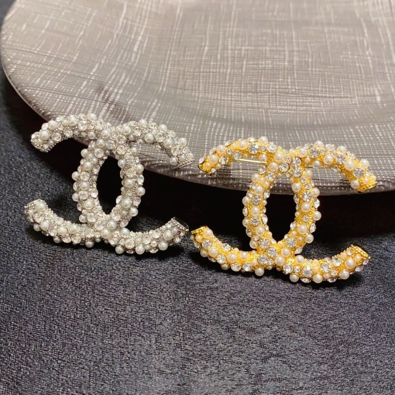 Ch**el brooches